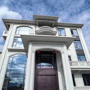 汉中白麻别墅外墙干挂石材效果示例