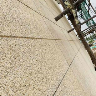 汉中 黄金麻花岗岩荔枝面外墙干挂石材效果示例