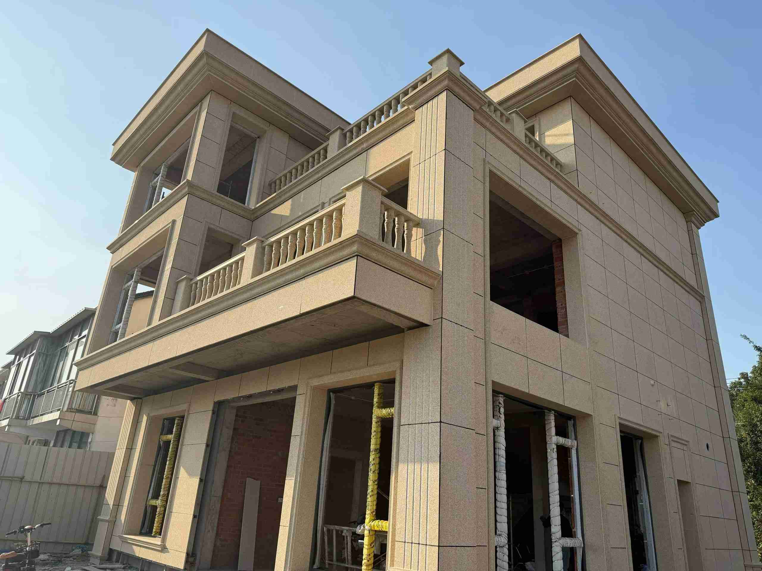 汉中 黄金麻花岗岩石材荔枝面外墙干挂效果展示