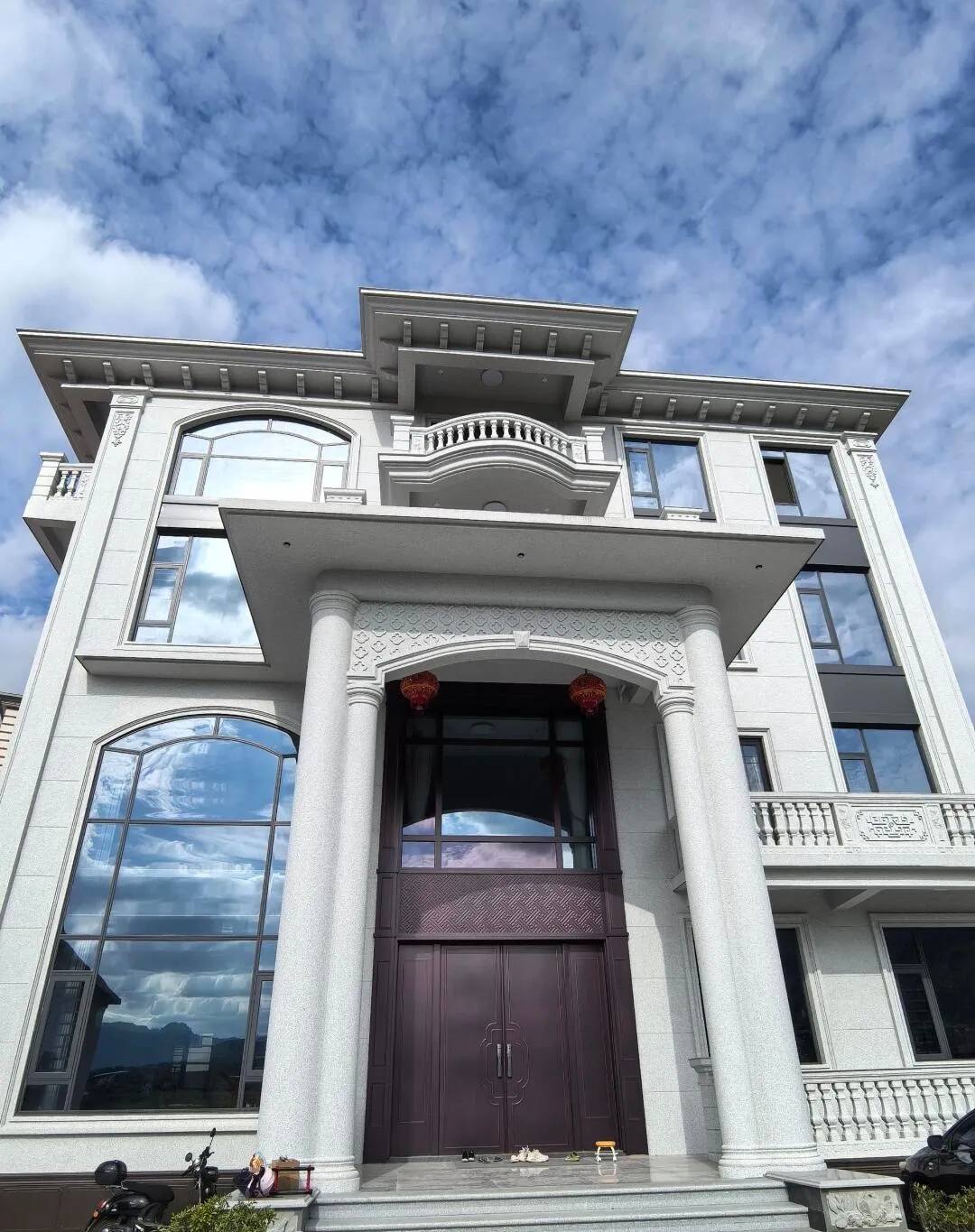 汉中白麻别墅外墙干挂石材效果示例